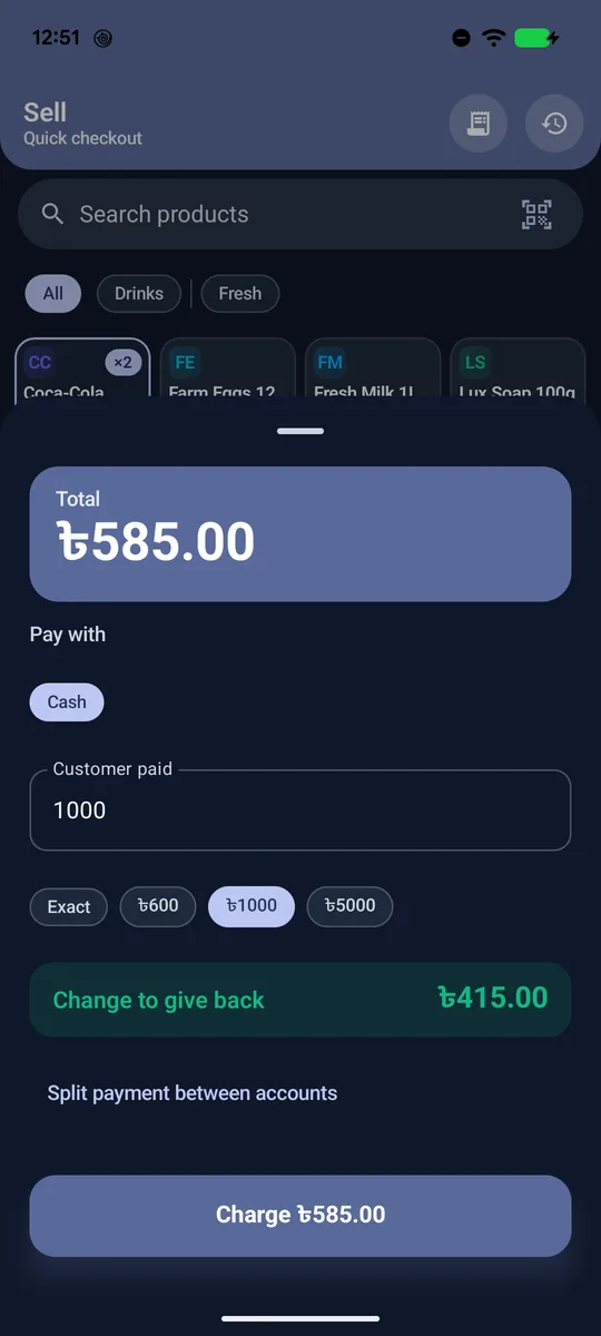 Payment screen with quick cash buttons and change