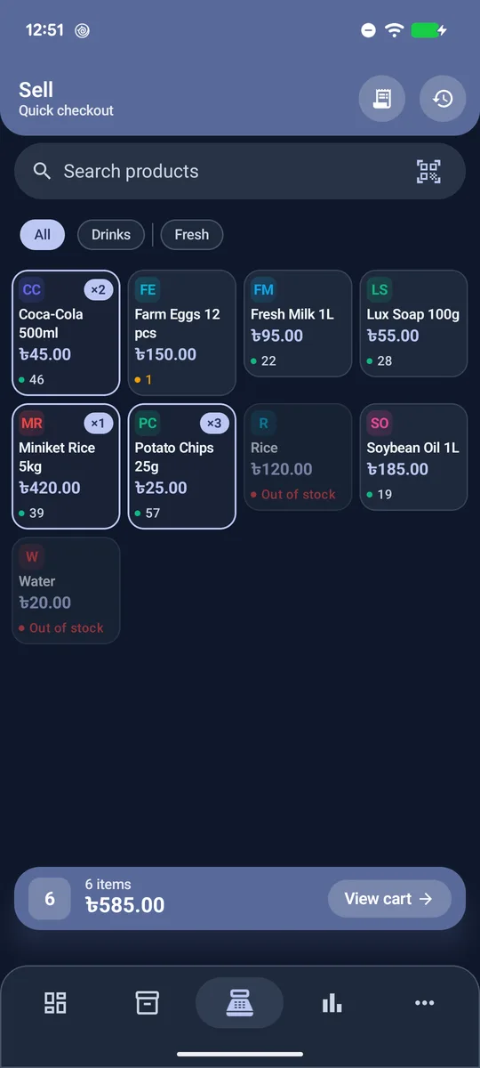 Sell screen with product tiles and the cart bar at the bottom